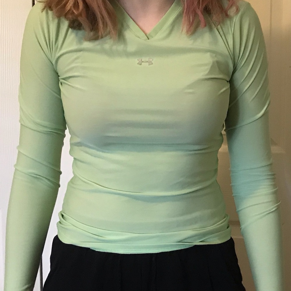 This is a green, tight, workout top.
